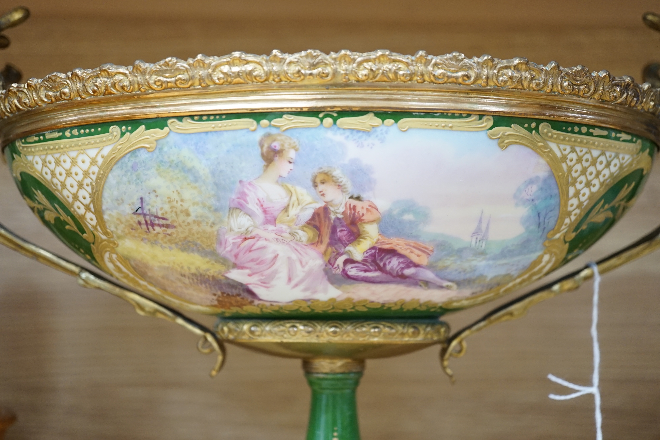 A Sevres-style ormolu mounted centrepiece. 31cm wide